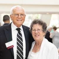Guests posing in the Grand Gallery at DeVos Place.